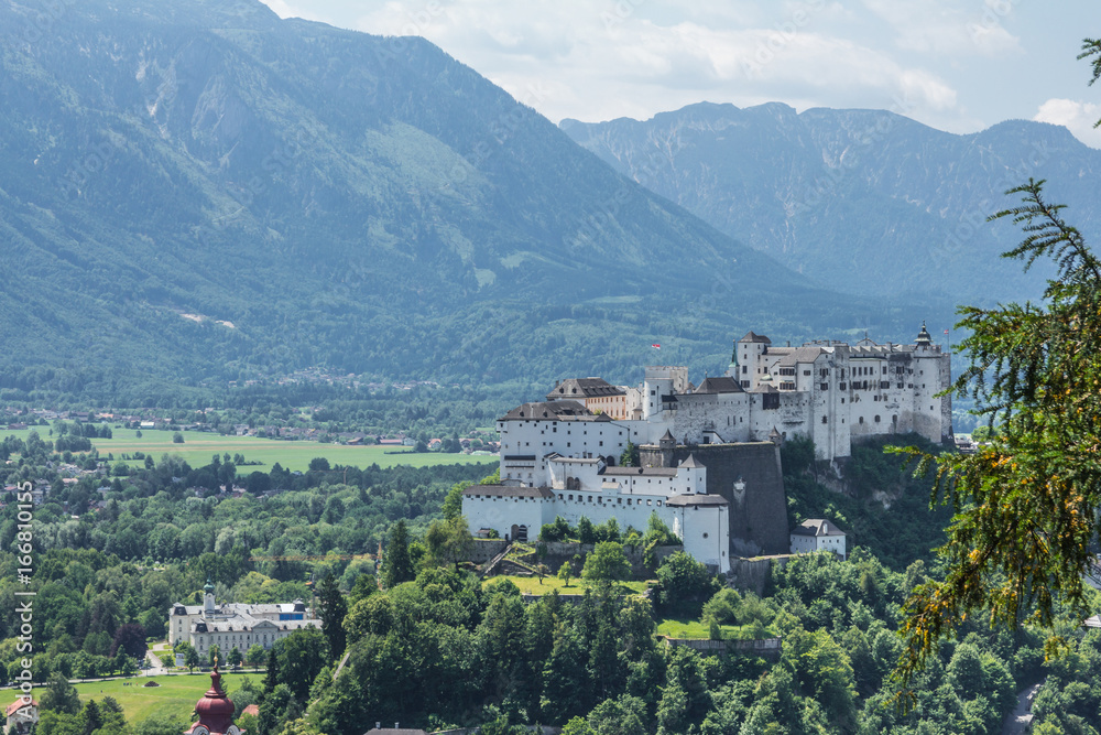 The Hohensalzburg Fortress is high above the roofs of the baroque old town of  Salzburg, Austria