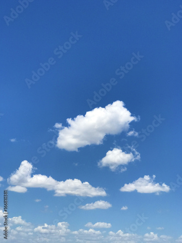 Blue sky and white fluffy clouds