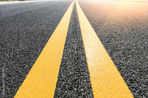New asphalt road texture background closeup