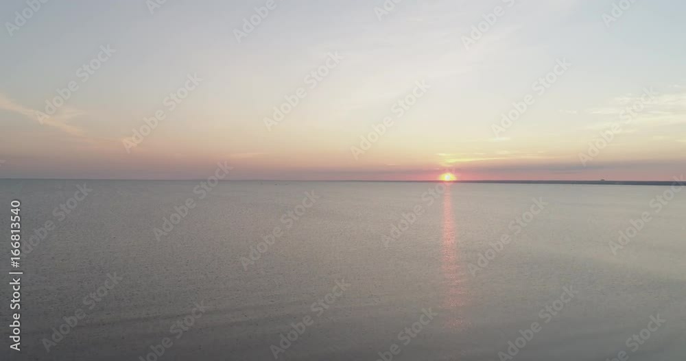 Aerial ascent over baltic sea in sunset time Aerial ascent over baltic sea in sunset time