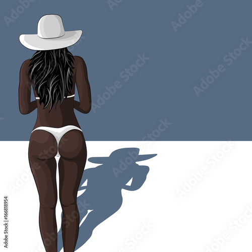 Sexy young african girl in swimsuit and sun hat