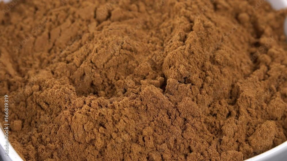 Portion of Cinnamon rotating on a wooden plate (not loopale; 4K) Portion of Cinnamon rotating on a wooden plate (not loopale; 4K)