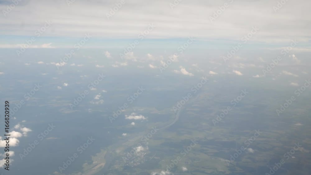 View through airplane window View through airplane window