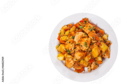 meat stew with potatoes, pepper, onion and carrot. top view. isolated on white