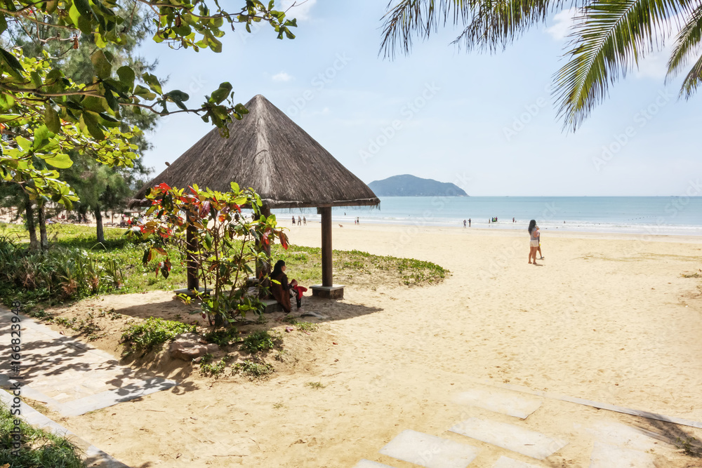 Panorama of the tropical beach of Hainan Island a luxury travel destination in China with beautiful beaches and lush vegetation