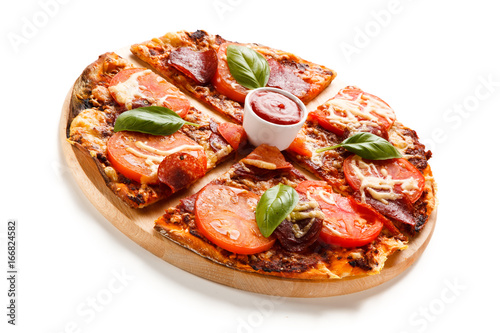Pizza pepperoni with tomatoes, mushrooms and olives 