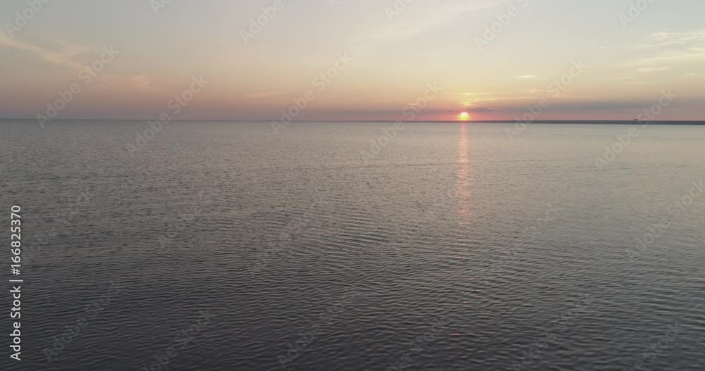Aerial forward fly over baltic sea in sunset time Aerial forward fly over baltic sea in sunset time