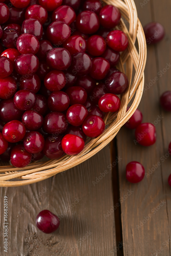 cherries on wooden surface cherries on wooden surface