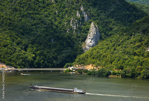 Spectacular Danube Gorges, also known as The Danube Boilers ,passing through the Carpathian Mountains, between Serbia and Romania. Decebal's Head sculpted in rock. photo