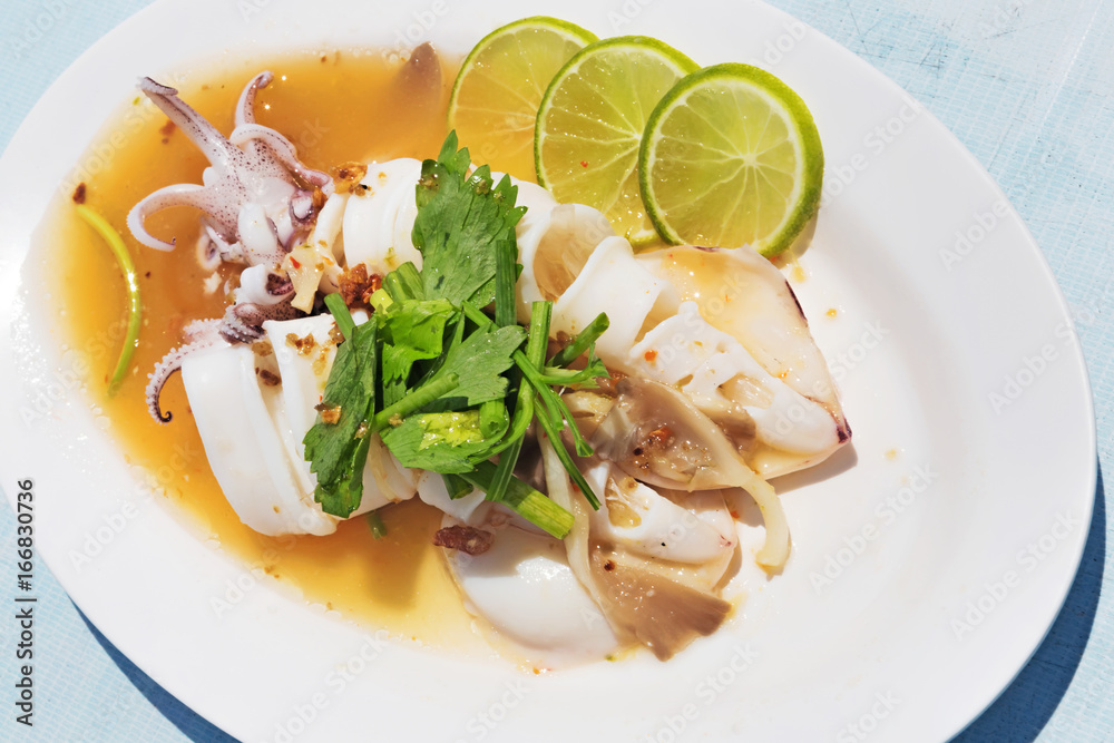 Thai recipe : Squid in lime sauce - selective focus Thai recipe : Squid in lime sauce - selective focus
