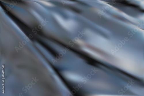 Abstract vector background of shiny flowing dark fabric