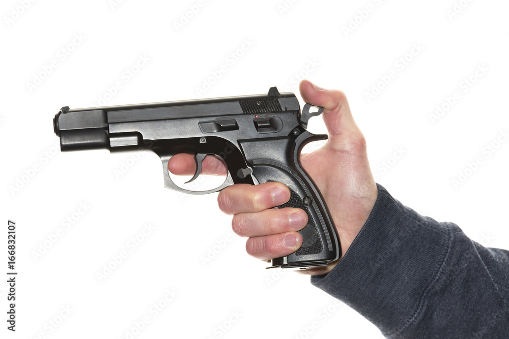 Man's hand holding gun isolated on white background Man's hand holding gun isolated on white background