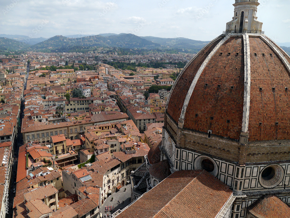 rooftop view of Florence from the top of Giotto’s Campanile with view of the dome of the  Florence Cathedral. Florence, Italy