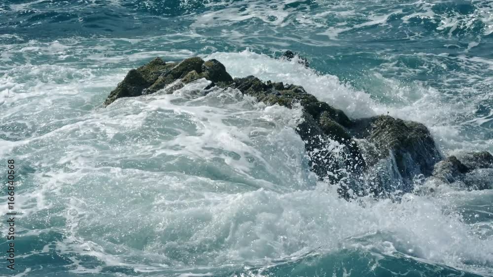 Big Waves Crash Over Rock In The Ocean Big Waves Crash Over Rock In The Ocean