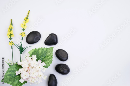 Flowers arrangement on a white background with copyspace. Spring floral concept.