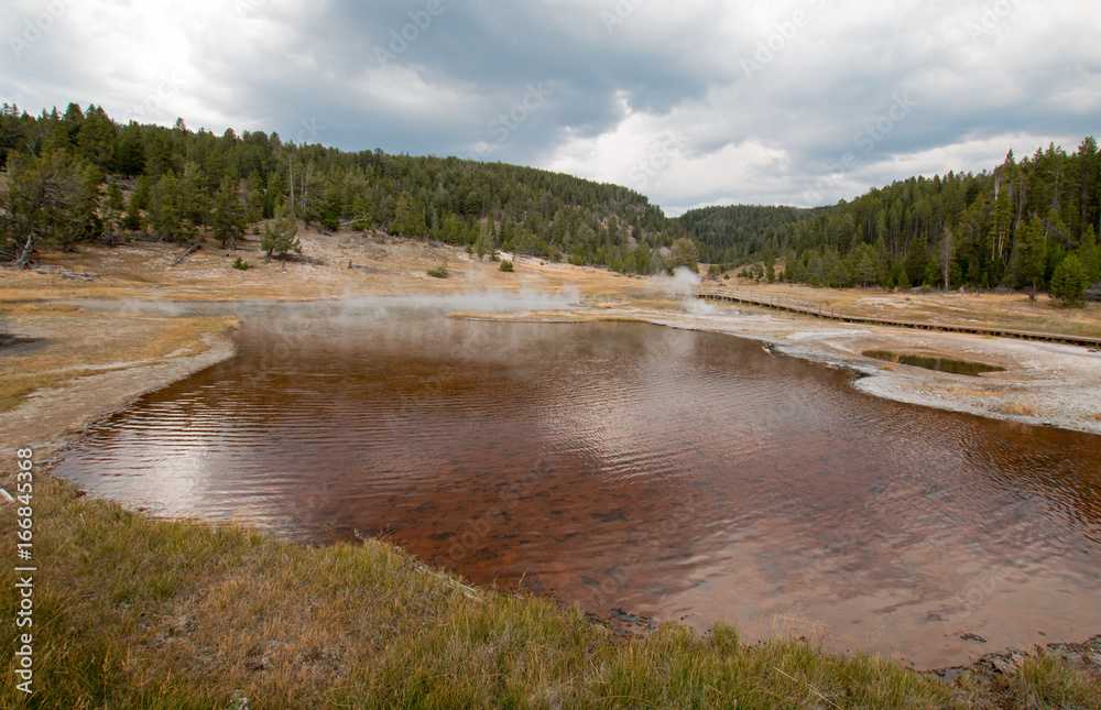 Firehole Lake in the Lower Geyser Basin in Yellowstone National Park in Wyoming United States