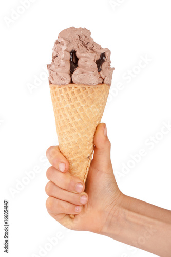 bitten chocolate ice cream in a waffle horn in the hand isolated