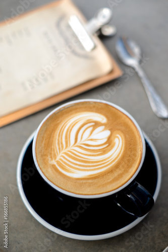Latte art coffee with glass