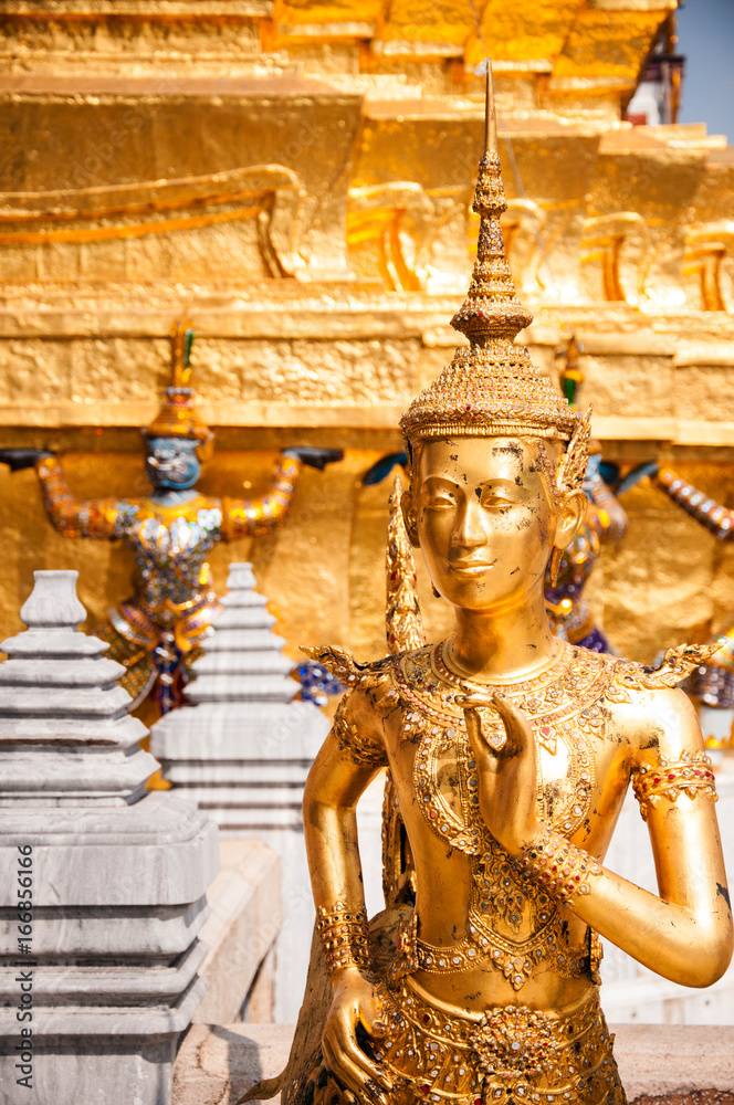 Fototapeta premium Golden angel statue, Interior of the Grand Palace in Bangkok. Thailand.