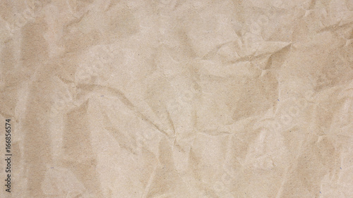 Recycled crumpled brown paper texture background for business education and communication concept design.