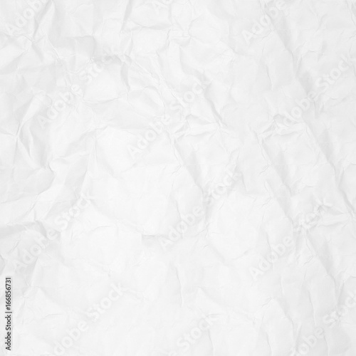 Crumpled white paper texture background for business education and communication concept design.