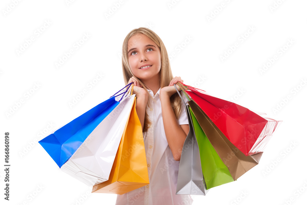 shopping, sale, christmas and holiday-lovely young girl with red shopping bags, isolated with copyspace shopping, sale, christmas and holiday-lovely young girl with red shopping bags, isolated with copyspace