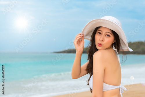 attractive Asian woman wearing sexy bikini