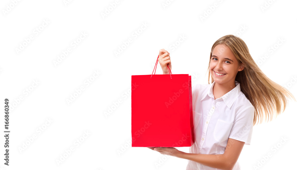 shopping, sale, christmas and holiday-lovely young girl with red shopping bag, isolated with copyspace shopping, sale, christmas and holiday-lovely young girl with red shopping bag, isolated with copyspace