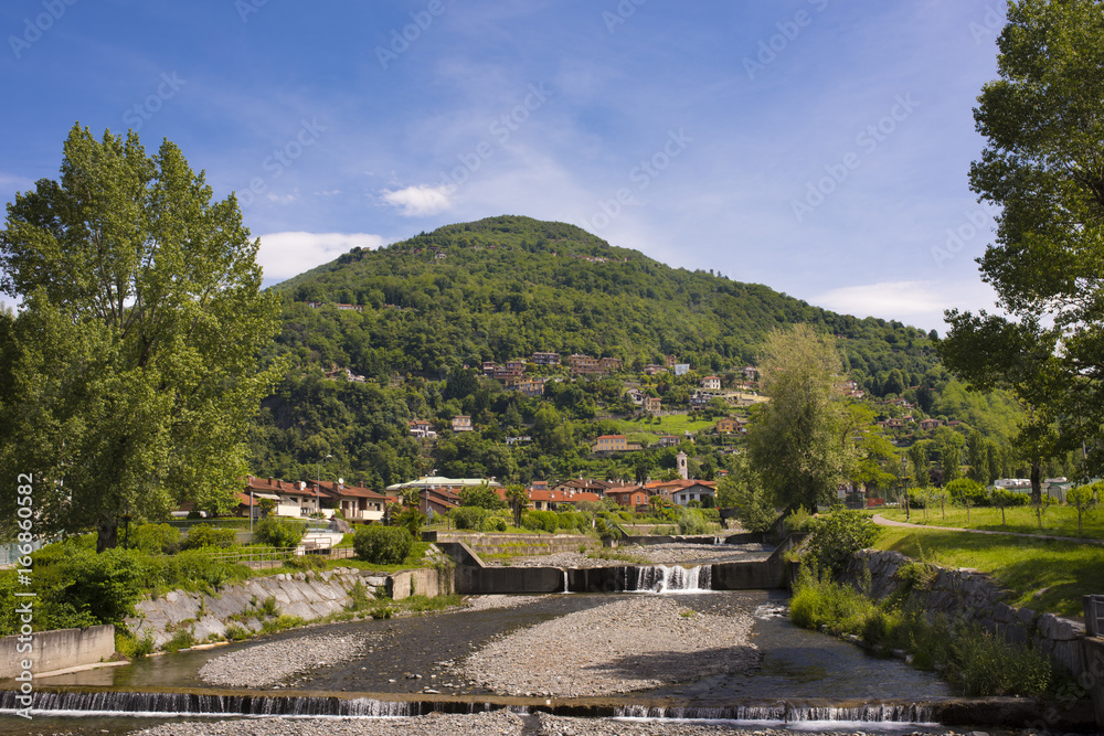 The mouth of the river Giona in the Lago Maggiore in Maccagno - Maccagno, Lake Maggiore, Varese, Lombardy, Italy The mouth of the river Giona in the Lago Maggiore in Maccagno - Maccagno, Lake Maggiore, Varese, Lombardy, Italy