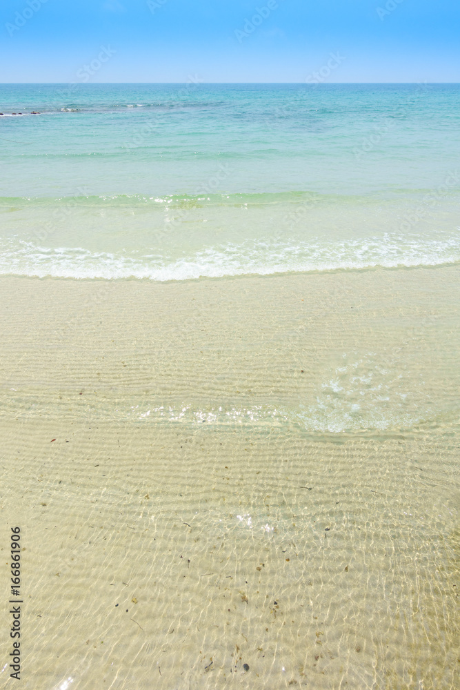 Beautiful crystal clear sea and tropical beach at tropical paradise island, Thailand