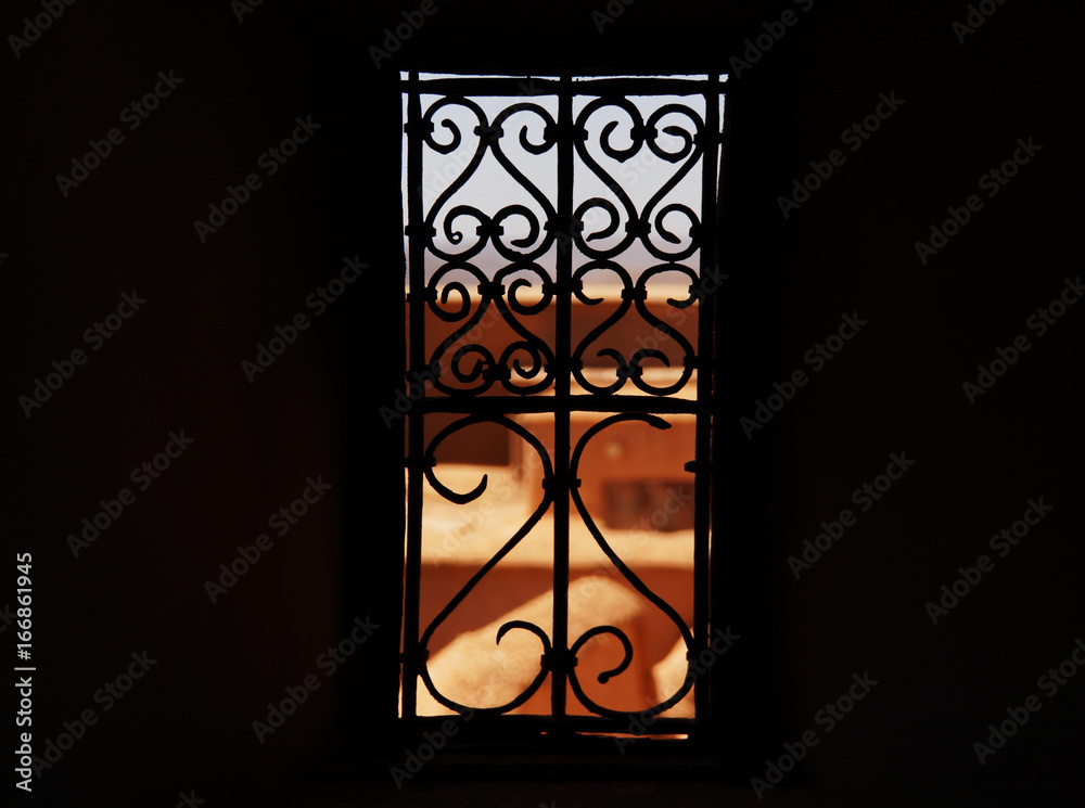 Metal grille in the window Metal grille in the window