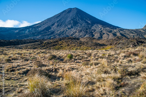 Mount Ngauruhoe or Mt.Doom the iconic famous volcano in Tongariro national park. This location was filmed in the hollywood movie The Lord Of The Rings trilogy. © boyloso