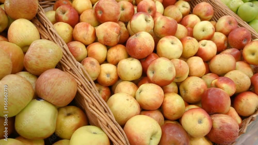 Ripe fresh red apples on sale at the market shelfs, closeup
Ripe fresh red apples on sale at the market shelfs, closeup