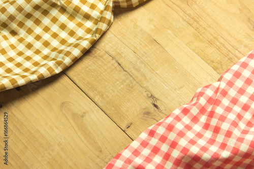 Brown and red plaid napkin on vintage table. copy space
