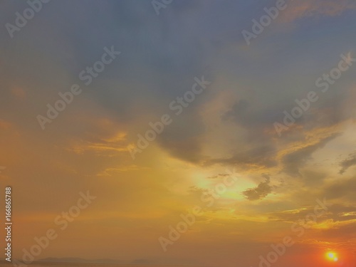 Amazing sunset colours at seaside with clouds  © imaginuma
