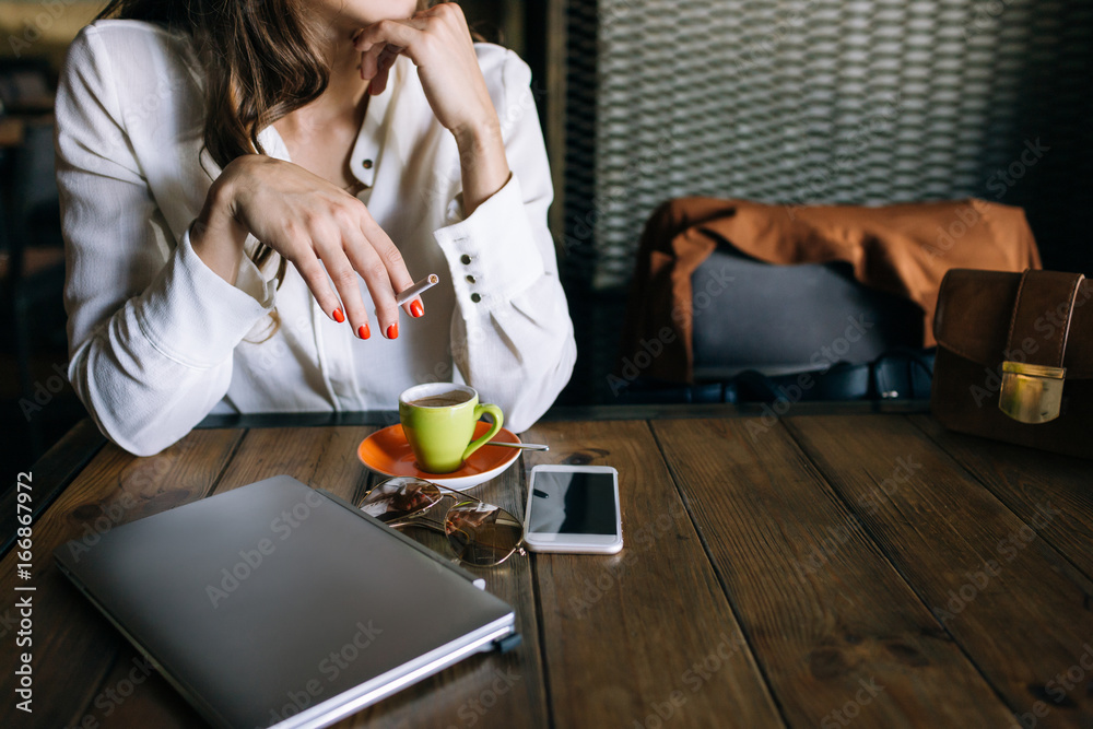 Lunch with successful business lady. Technology background, secretary coffee break, unrecognizable stylish female with bad habits Lunch with successful business lady. Technology background, secretary coffee break, unrecognizable stylish female with bad habits