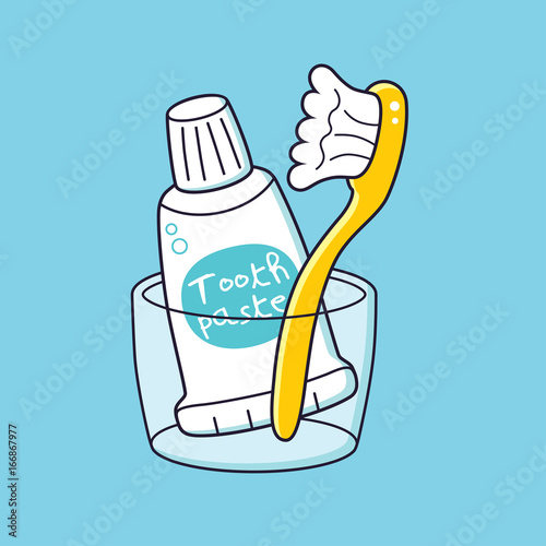 Toothbrush and toothpaste in a cup.
