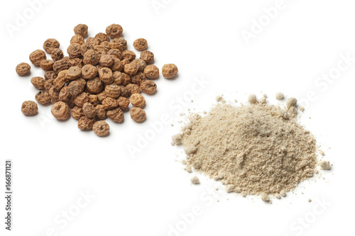 Heap of tigernut flour and tigernuts