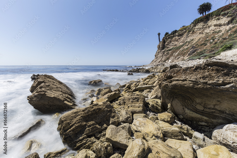 Rugged rocky shoreline with motion blur water in Rancho Palos Verdes near Los Angeles, California. Rugged rocky shoreline with motion blur water in Rancho Palos Verdes near Los Angeles, California.