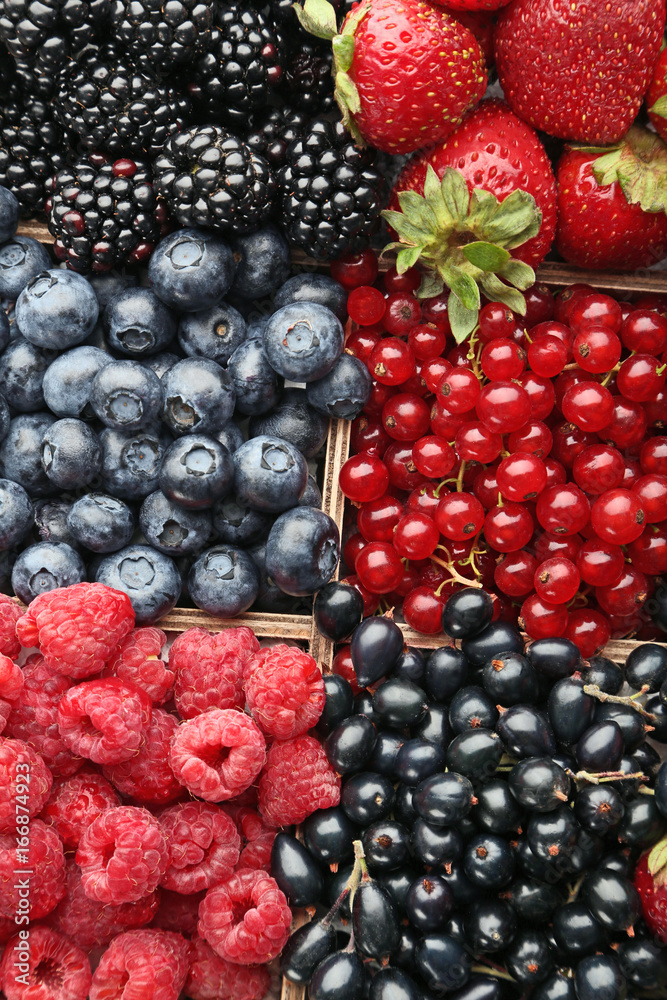 Ripe and sweet berries in wooden box Ripe and sweet berries in wooden box