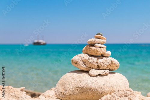 stack of rocks at an island near crete greece