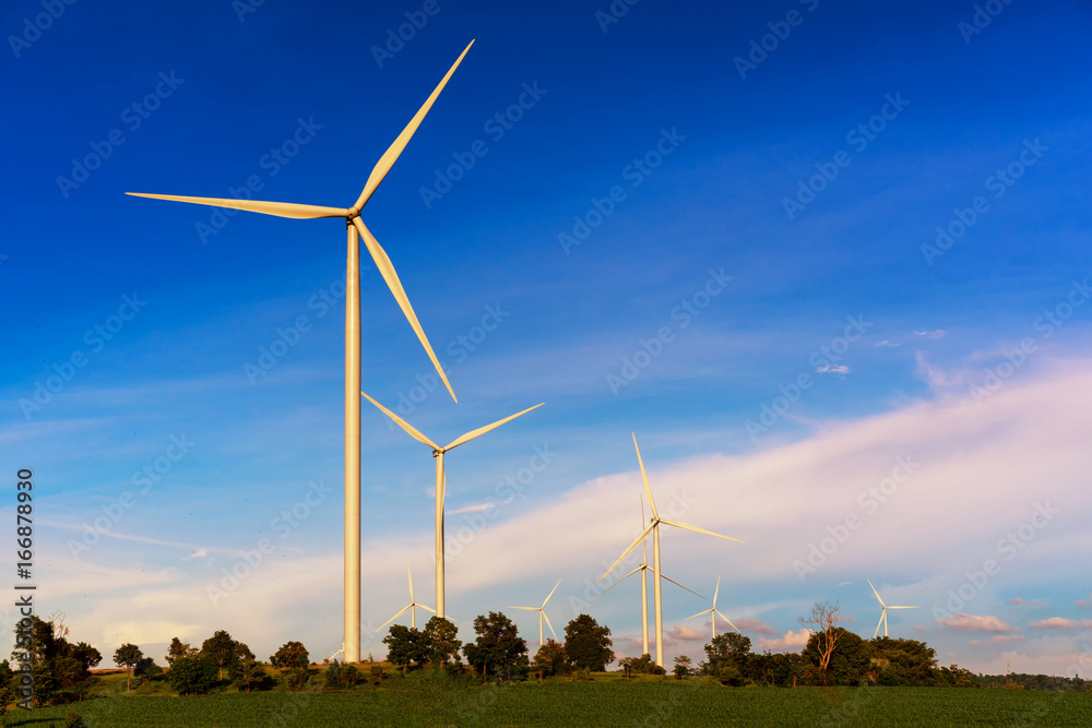 Clean energy; Wind turbine generates electricity in agricultural fields, alternative energy from nature is clean energy does not affect the way of life of the community.