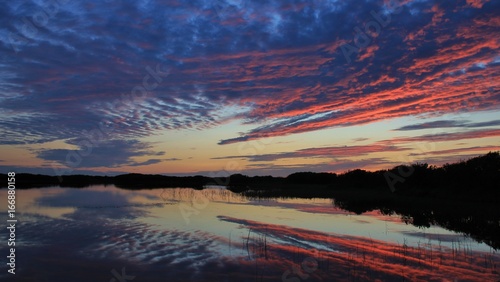 Fototapeta Naklejka Na Ścianę i Meble -  Colorful sky at the west coast of Denmark. Gronnestrand.