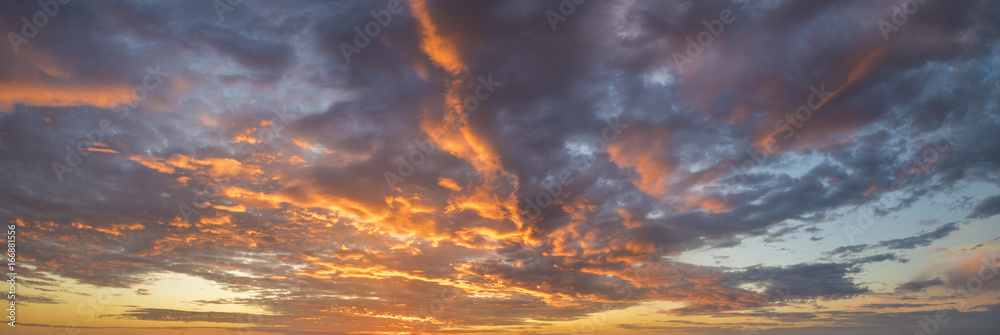 Fiery sunset, colorful clouds in the sky