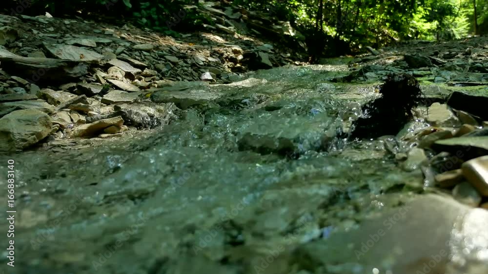Large stones on a mountain river with clear blue water. beautiful nature Large stones on a mountain river with clear blue water. beautiful nature