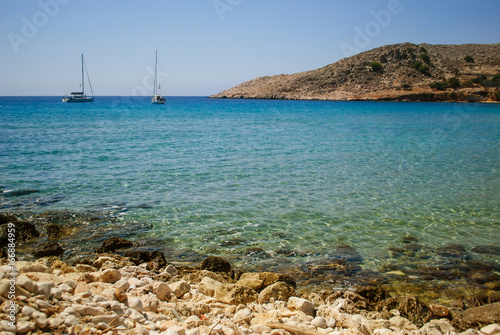 Turquoise waters exceptionally strong colors and sharp rocks that surround it