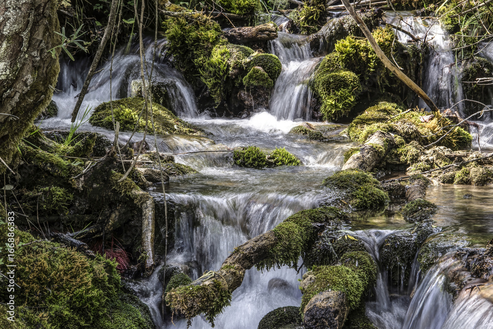 Waterfalls in a mountain stream Waterfalls in a mountain stream