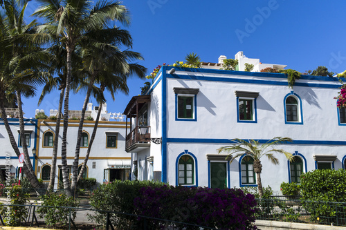 Old town, harbor of historic town Mogan Gran Canaria at perfect sunny weather with blue skies in the morning.