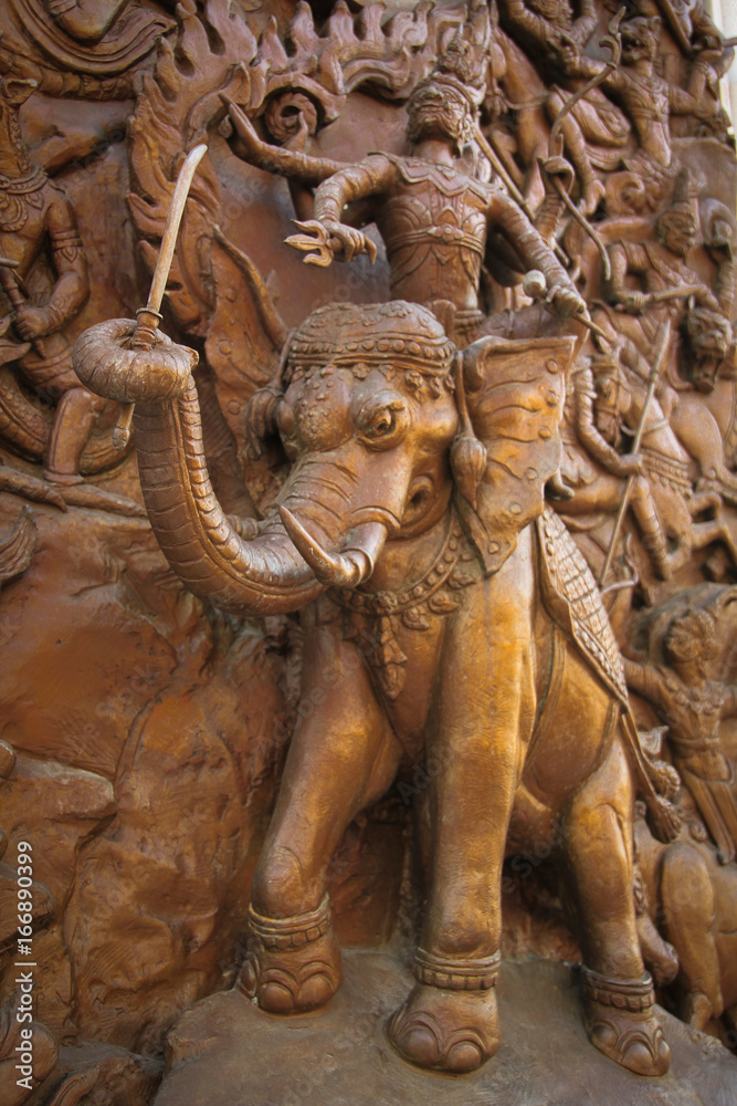 Elephant carved temple door in the countries of Thailand