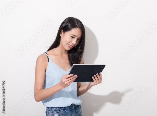 Young Woman using tablet computer